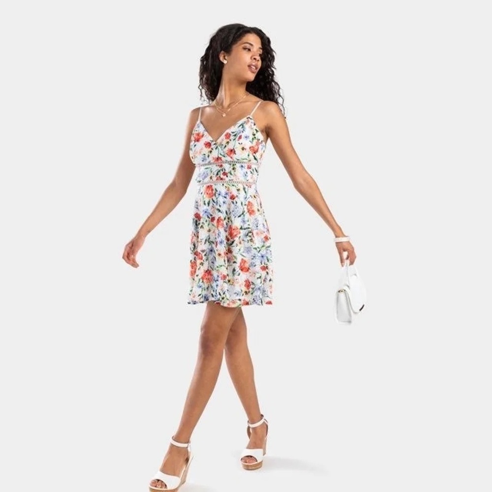 Blue Rain Francesca’s dress size L white with multi color flowers